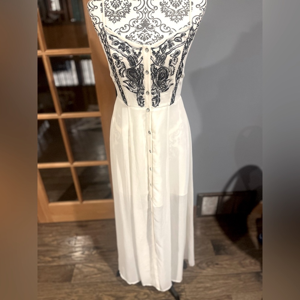 Ecoté size medium midi dress with sheer overlay.